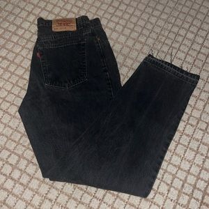 vintage black denim levis with let out bottom hem